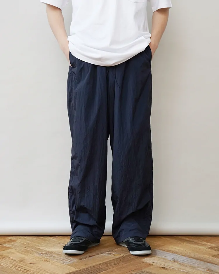 ATON (MEN) / HAND DYE NYLON OVER PANTS / NAVY