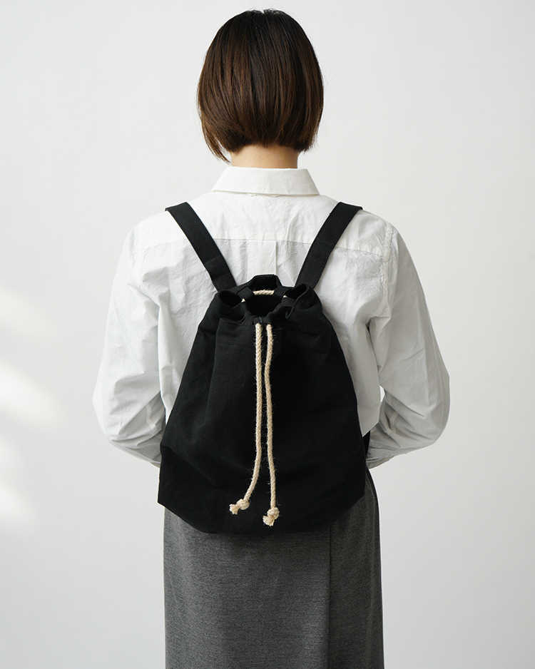 YAECA (WOMEN) / Drawstring Backpack / KUSAKI BLACK