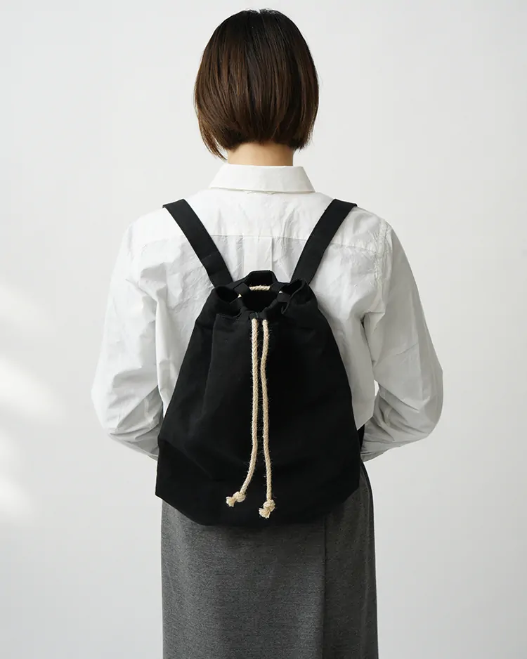 YAECA (WOMEN) / Drawstring Backpack / KUSAKI BLACK